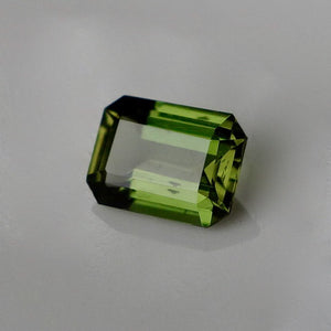 Green zircon emerald cut. Rare color grass green