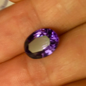 This rare blue spinel has an even rarer color change to purple.