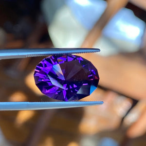 9.44 carat Amethyst, Uruguay, Red Flash, Flawless, Rare In This Quality Cushion Cut Oval