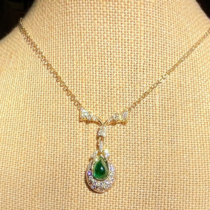 5.56 ct. Emerald Cabochon Pendant - Necklace in 18k Yellow Gold and 2 carats Of Round VS-G Or Better Diamond on 18k Gold Chain.