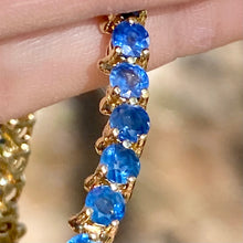 Pulled for GIA certification. 14 tcw. Blue Sapphire Tennis Bracelet, Suspected Pailin, 14k Yellow Gold. Coupon may be used on sale price.